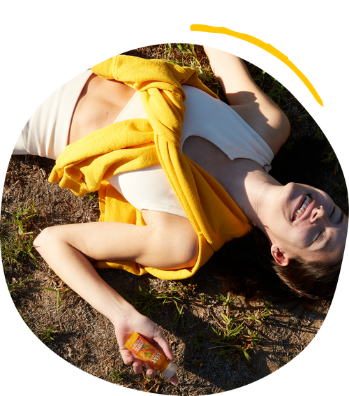 girl lying down on the ground with a vive shot in her hand