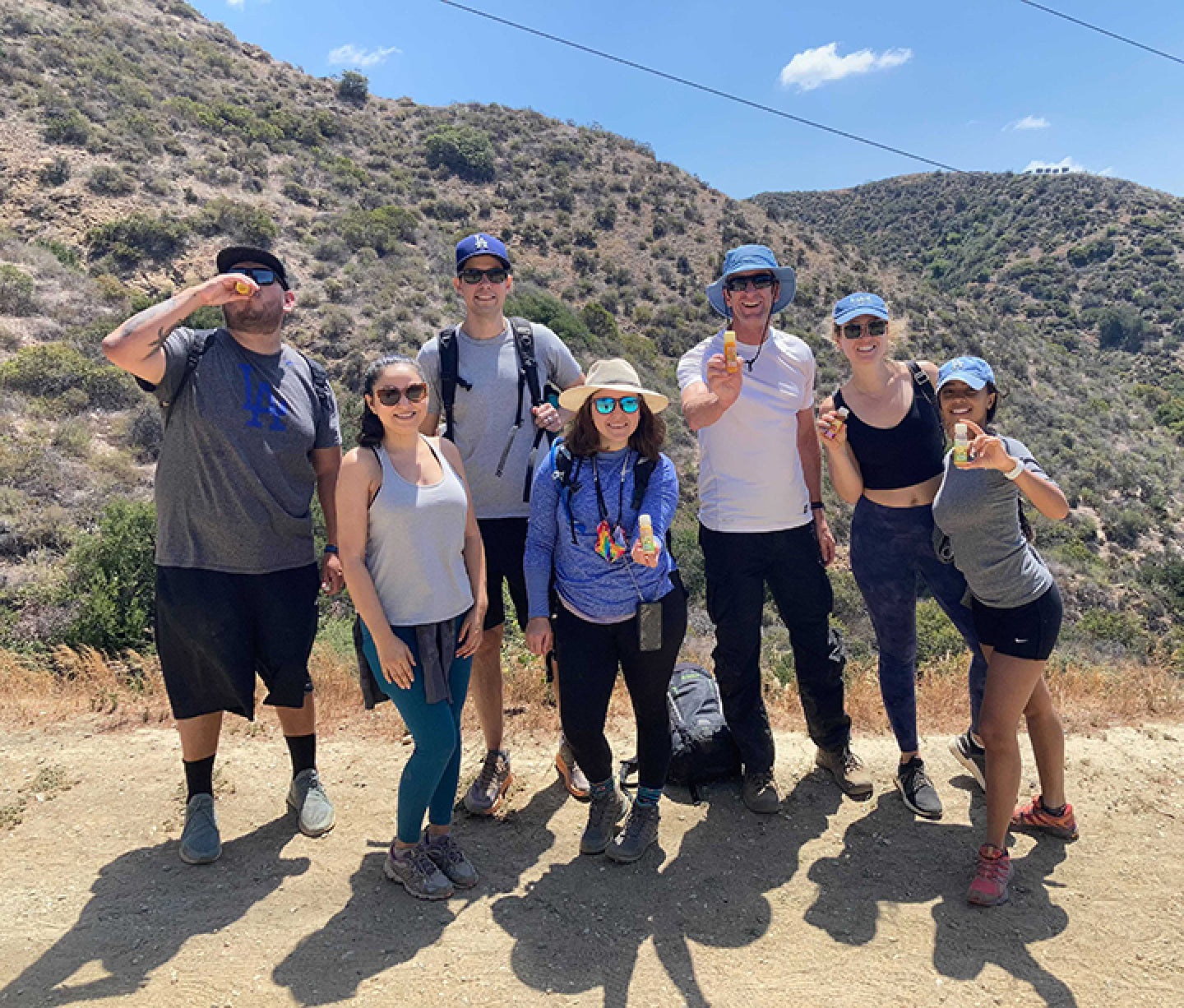 vive team members taking Vive shots in the mountains on a hike